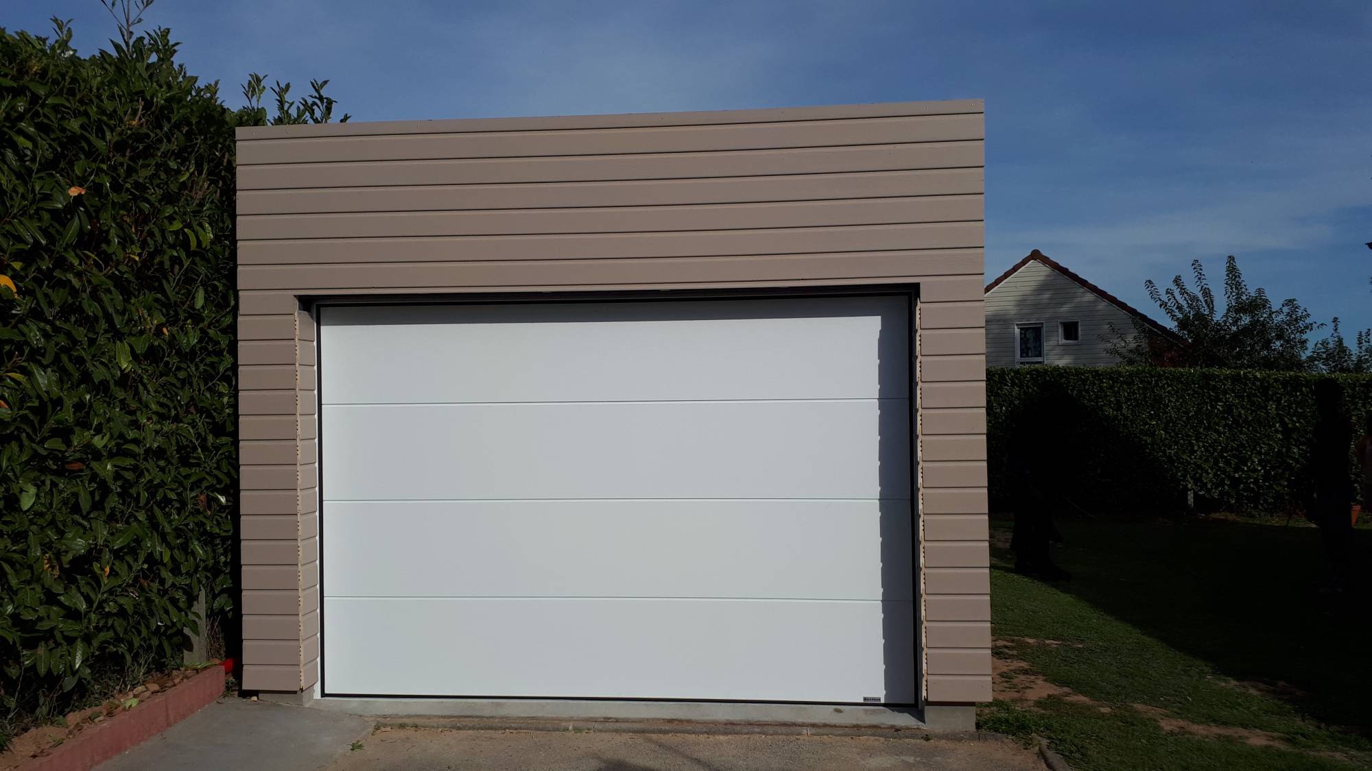 OPTEZ POUR UNE PORTE DE GARAGE SECTIONNELLE