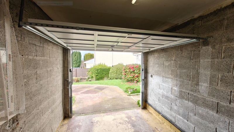 Fourniture et pose porte de garage manuelle NOVOFERM à Manéglise