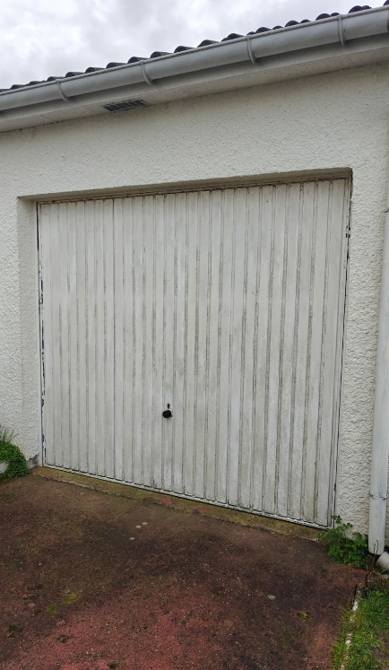 Pose porte de garage acier nervurée horizontale à Manéglise par professionnel