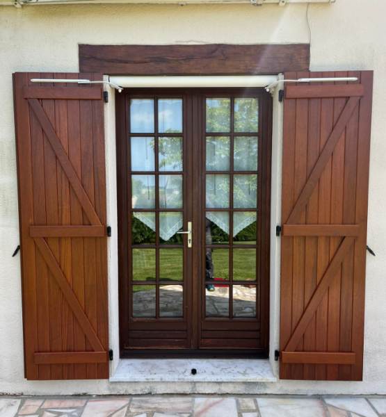 Faire remplacer des volets battants en bois par un artisan sur Epouville